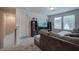 Cozy upstairs living room with carpeting, media center, and natural light at 419 Murphy Ave, Canton, GA 30114