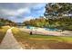 The community park features playground equipment with slides and swings, providing a safe place for children to play at 419 Murphy Ave, Canton, GA 30114