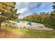 Community playground, featuring multiple slides, swings, and play equipment, provides a fun space for children at 419 Murphy Ave, Canton, GA 30114