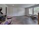 Spacious recreation room with dark wood floors, games and natural light at 419 Murphy Ave, Canton, GA 30114