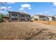 Spacious backyard with a privacy fence offers plenty of room for recreation and relaxation at 4585 Woodland Bank Blvd, Buford, GA 30518