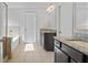 Bathroom featuring tile flooring, a glass enclosed shower and a double vanity with granite countertops at 4585 Woodland Bank Blvd, Buford, GA 30518