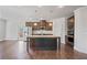 Modern kitchen with stainless steel appliances and center island at 4585 Woodland Bank Blvd, Buford, GA 30518