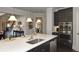 Gourmet kitchen featuring a large island and stainless steel appliances at 4585 Woodland Bank Blvd, Buford, GA 30518
