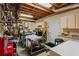 Organized basement with workbench, cabinets, and ample storage space for various projects and tools at 9860 Hunt Club Way, Johns Creek, GA 30022