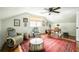 Attic bonus room with sloped ceilings, hardwood floors, and abundant natural light at 1477 Brawley Ne Cir, Brookhaven, GA 30319