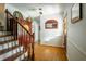 Elegant foyer with hardwood floors, stylish furnishings, and staircase, providing a grand entry at 1477 Brawley Ne Cir, Brookhaven, GA 30319