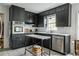 Stylish kitchen equipped with modern appliances, sleek countertops, and efficient storage solutions at 1477 Brawley Ne Cir, Brookhaven, GA 30319