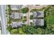 Aerial view showcasing well-placed homes in a tidy neighborhood, enhanced by greenery and a neatly designed street layout at 201 Saddle Rd, Alpharetta, GA 30009