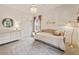 Charming bedroom featuring a daybed, chandelier, and neutral decor at 201 Saddle Rd, Alpharetta, GA 30009