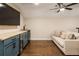 Entertainers space featuring a wet bar, wine fridge, and hardwood floors at 201 Saddle Rd, Alpharetta, GA 30009