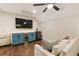 Entertainment space featuring a wet bar, wine fridge, and comfortable sofa at 201 Saddle Rd, Alpharetta, GA 30009
