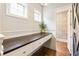 Cozy office nook with a wooden desk and white cabinets and drawers at 201 Saddle Rd, Alpharetta, GA 30009