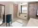 Bright bathroom featuring double vanity, soaking tub, tiled shower, and tile flooring at 2815 Cambridge Hills Rd, Cumming, GA 30041
