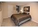 Finished basement bedroom with tile floor, bed, and window at 2815 Cambridge Hills Rd, Cumming, GA 30041