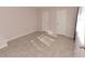 Finished basement bedroom with tile floor and dual closets at 2815 Cambridge Hills Rd, Cumming, GA 30041