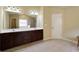 Spacious primary bath with double vanity and plenty of storage space at 3541 Stoneleigh Walk, Lithonia, GA 30038