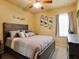 Bright, well-lit bedroom with ample lighting and neutral tones at 3541 Stoneleigh Walk, Lithonia, GA 30038
