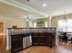 Kitchen with granite countertops, stainless steel appliances, and breakfast bar at 3541 Stoneleigh Walk, Lithonia, GA 30038