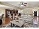 Cozy living room, featuring a sofa and open access to the kitchen at 3541 Stoneleigh Walk, Lithonia, GA 30038