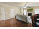 Spacious living room featuring a fireplace and hardwood floors at 3541 Stoneleigh Walk, Lithonia, GA 30038