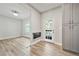 Bright dining room with hardwood floors and access to outdoor patio at 3988 Centennial Trl, Duluth, GA 30096