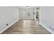 Inviting living room featuring hardwood floors and large windows at 3988 Centennial Trl, Duluth, GA 30096