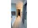 Bathroom with a tub, vanity, mirror, and doorway to the main bedroom at 209 Southerness Ct, Stockbridge, GA 30281