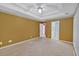 Primary bedroom showcasing an en-suite bathroom through an open doorway at 209 Southerness Ct, Stockbridge, GA 30281