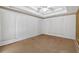 Large bedroom with a tray ceiling, ready for your personal touch at 209 Southerness Ct, Stockbridge, GA 30281