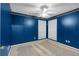 Bedroom featuring a ceiling fan and windows at 209 Southerness Ct, Stockbridge, GA 30281