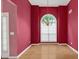 Formal dining room with a chandelier and a large window with natural light at 209 Southerness Ct, Stockbridge, GA 30281