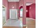 Welcoming foyer with tile flooring and views into the living areas, providing an open and inviting entrance at 209 Southerness Ct, Stockbridge, GA 30281