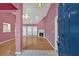 Bright living room featuring hardwood floors, a fireplace, and a ceiling fan at 209 Southerness Ct, Stockbridge, GA 30281