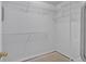 Spacious walk-in closet features white wire shelving to help you stay organized at 209 Southerness Ct, Stockbridge, GA 30281