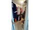 Well-organized walk-in closet with ample hanging space and shelving for optimal storage solutions at 209 Southerness Ct, Stockbridge, GA 30281