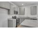 Modern kitchen featuring granite countertops, stainless steel appliances, and neutral cabinetry at 209 Weldon, Mcdonough, GA 30253