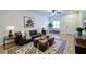 Comfortable living room with stylish furniture, modern decor, and hardwood flooring at 2162 Spikerush Way, Buford, GA 30519