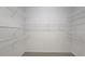 Empty walk-in closet features wire shelving at 225 Mountain Vista Blvd, Canton, GA 30115