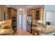 Gourmet kitchen with custom cabinetry, granite countertops, stainless steel appliances, and hardwood flooring at 225 Mountain Vista Blvd, Canton, GA 30115