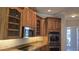 Well-equipped kitchen features stainless steel appliances, granite countertops, and plenty of wooden cabinets at 225 Mountain Vista Blvd, Canton, GA 30115