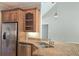 This kitchen features stainless steel appliances, granite countertops, and a double sink at 225 Mountain Vista Blvd, Canton, GA 30115