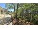 Inviting patio space with outdoor seating overlooking a serene wooded area, perfect for enjoying nature at 225 Mountain Vista Blvd, Canton, GA 30115