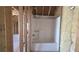 Unfinished bathroom with a tub and shower combo, ready for customization and finishing touches at 225 Mountain Vista Blvd, Canton, GA 30115