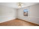 Well-lit bedroom with hardwood floors, chair rail and one window showcasing the home's traditional style at 3025 Kaley Nw Dr, Kennesaw, GA 30152