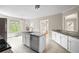 Bright kitchen featuring stainless steel appliances, a granite island, and a breakfast nook at 3025 Kaley Nw Dr, Kennesaw, GA 30152