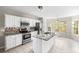 Modern kitchen with stainless steel appliances, granite countertops, and a central island at 3025 Kaley Nw Dr, Kennesaw, GA 30152