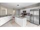Beautiful kitchen with stainless steel appliances, granite countertops, and a central island at 3025 Kaley Nw Dr, Kennesaw, GA 30152
