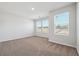 Bright, airy bedroom with plush carpet, ample natural light, and neutral paint at 358 Orwell Dr, Social Circle, GA 30025