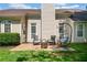 Cozy back patio with seating area, perfect for relaxation and outdoor enjoyment at 1483 Chamirey Sw Dr, Marietta, GA 30008
